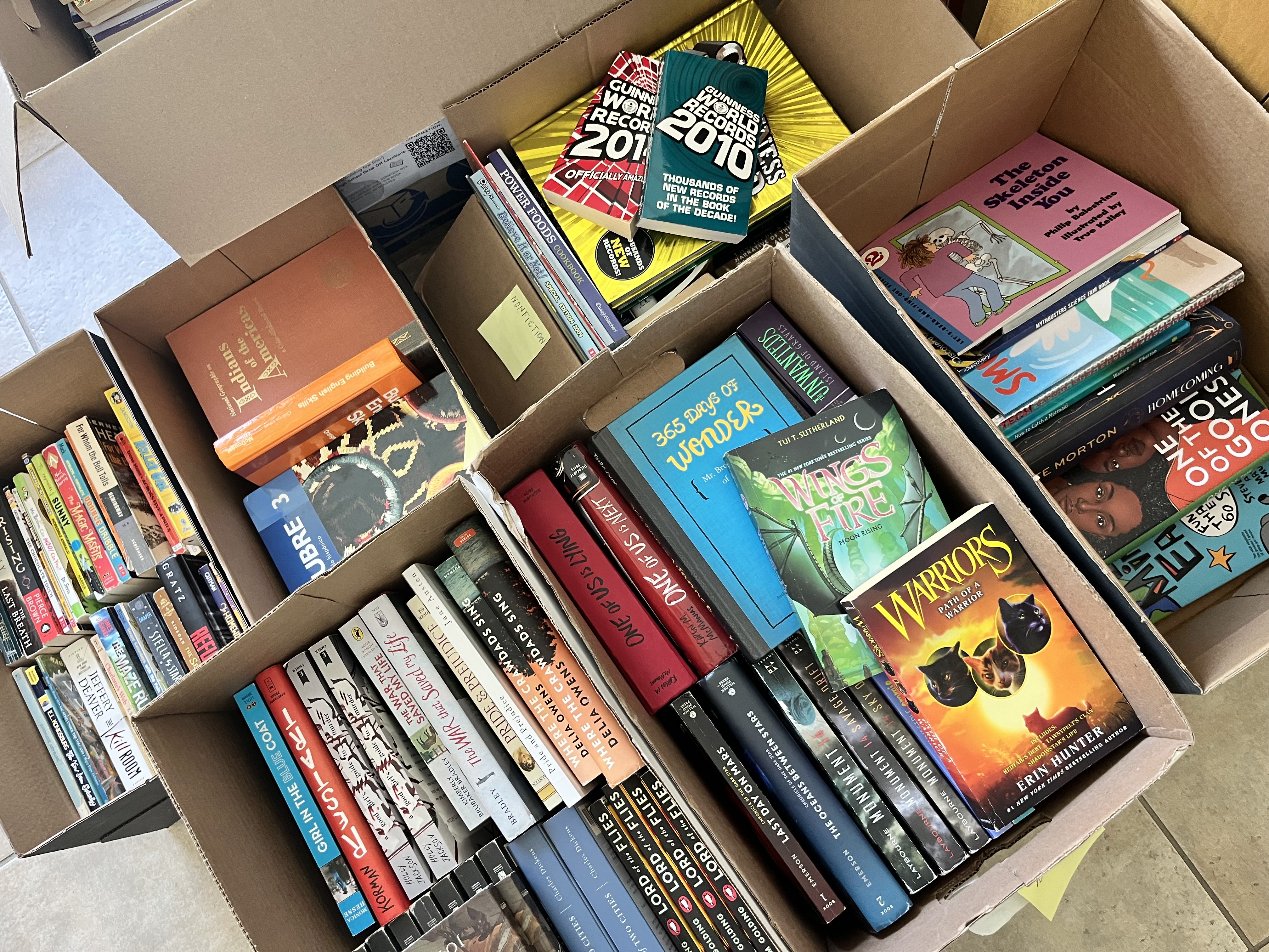 2025 Book Drive Collected Books in boxes