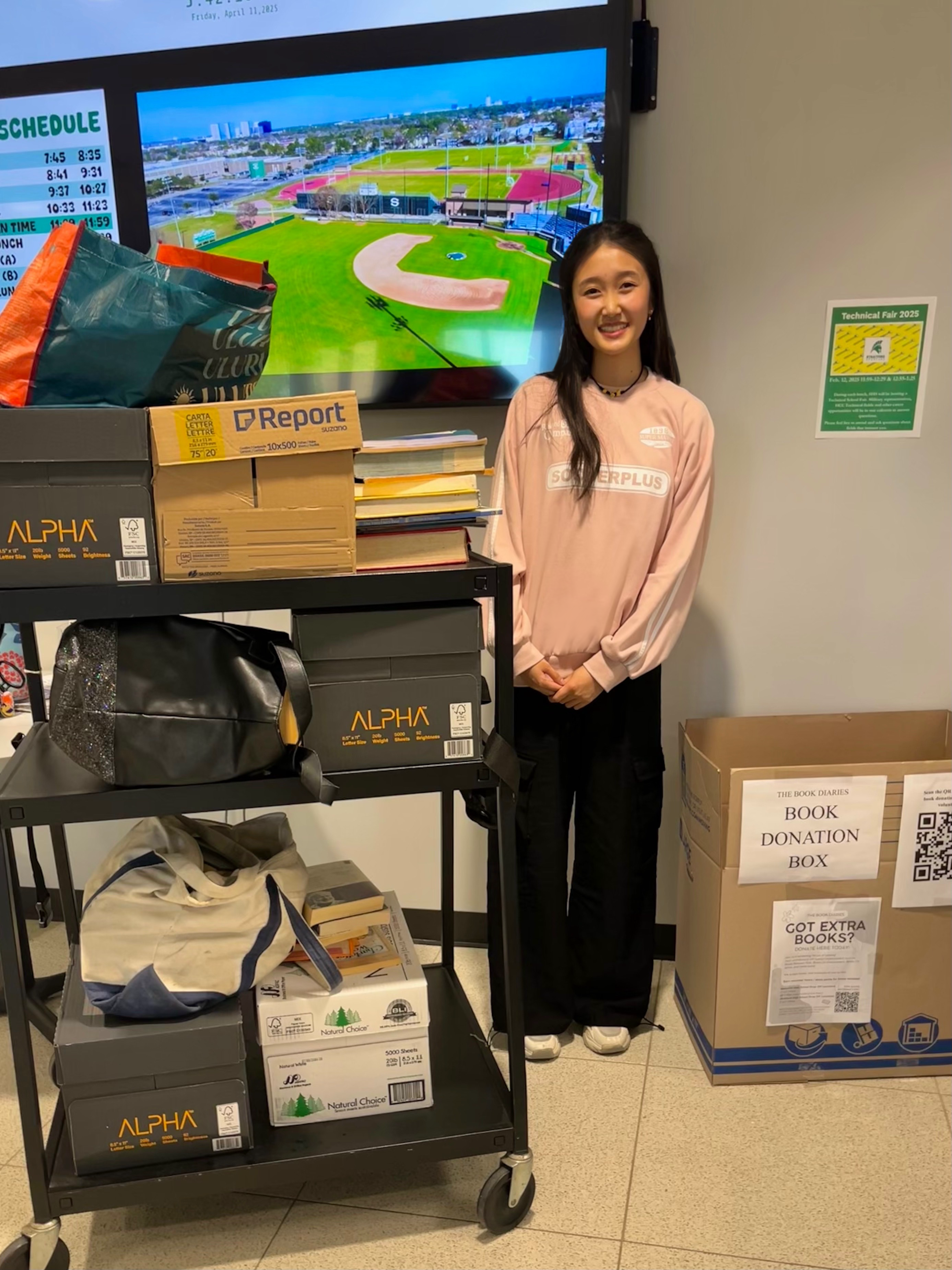 Stephanie & 2025 Book Drive Collected Books at Stratford